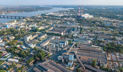 Aerial top view of industrial park zone from above, factory chimneys and warehouses, industry district in Kiev (Kyiv), Ukraine
