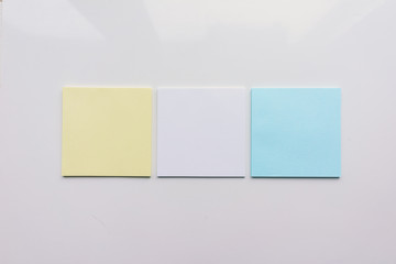 Three square sheet on a white background. Top view. Close-up