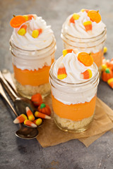 Halloween dessert in a jar layered candy corn parfait