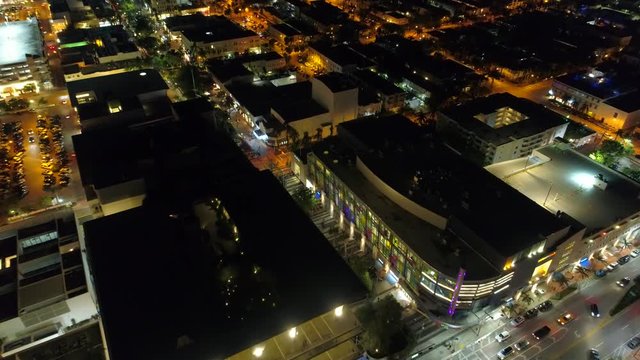 Aerial establishing shot Lincoln Road Miami Beach at night