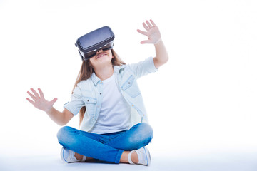 Happy cute girl enjoying 3d reality