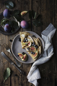 Breakfast with crepes and fruit