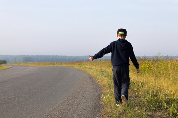 the little boy hitchhiking