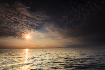Fototapeta na wymiar Baltic sea sunset horizon and cloudy sky