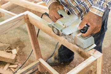 Hand of Carpenter is working in Rongngæ temple at Nan Province, Thailand.