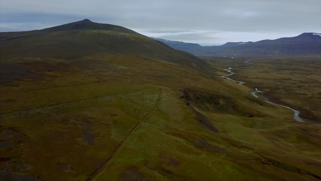 Aerial footage of dramatic wild icelandic highland landscape. Lava and volcano Icelandic landscape from above.