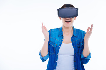 Delighted excited woman enjoying virtual reality