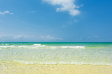Beautiful gentle wave and bright water at the tropical beach
