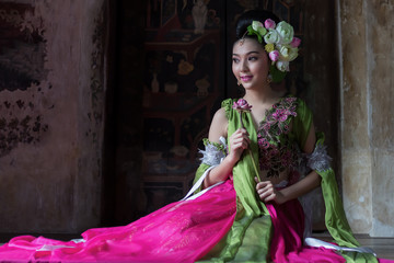 Close up of beautiful Thai woman in traditional dress costume identity culture of Thailand