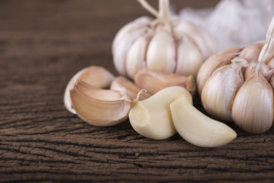 garlic bulb on wooden background