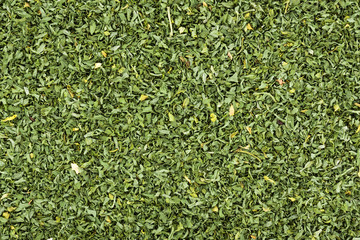 Closeup dried parsley background