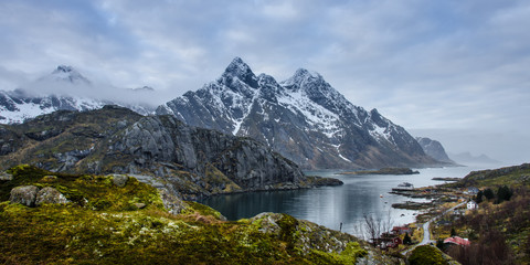 Fototapeta na wymiar Lofoten landscape with mountains, snow, and the sea