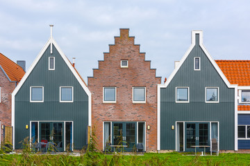 Volendam is a town in North Holland in the Netherlands. Colored houses of marine park in Volendam. North Holland, Netherlands..