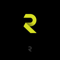  R logo. R monogram. Yellow origami letter on dark background.