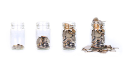 Coin money in glass bottle step from empty to full , Concept save money or investment financial