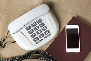 Phones old and modern. Old telephone and mobile,concepts compare new and old technologies.