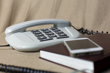 Phones old and modern. Old telephone and mobile,concepts compare new and old technologies.