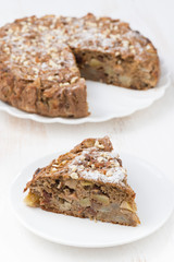 piece of homemade apple pie on white table