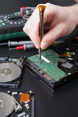 Naklejka premium Hard disc drive disassembling close up