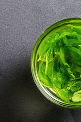Mint tea in a glass, top view