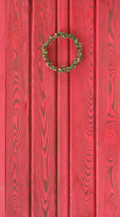 flower wreath on the red door
