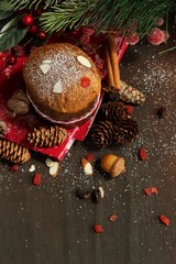 Mini Panettone on festive holiday Xmas background, selective focus