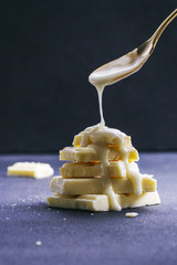 Pouring icing on white chocolate