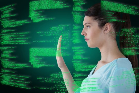 Composite image of young woman using digital screen