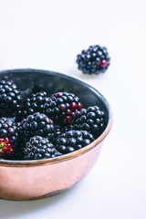 Blackberries in a copper bowl
