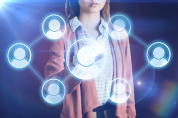 Composite image of businesswoman pointing 