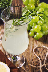 Alcoholic coctail with rosemary, closeup
