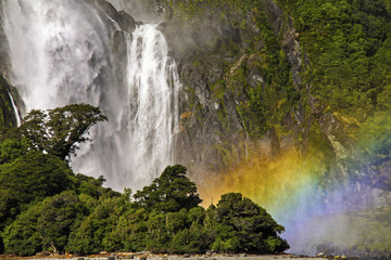 Bowen Falls Landscape and Rainbow Colors in Milford Sound, Fiordland National Park, New Zealand