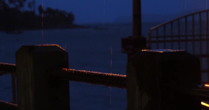 Rainy Twighligths at sea with morning peer against islands on background