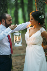 boyfriends  in the field holding a oil bluff