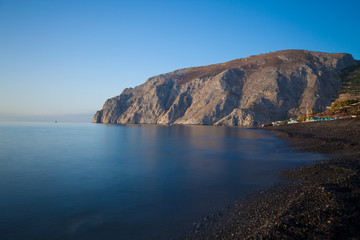 Sea cliff and calm sea