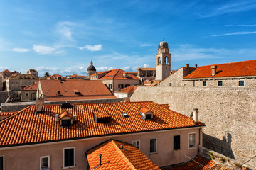 Fototapeta premium Red tiled roofs of Dubrovnik Old Town, view from the ancient city wall. The world famous and most visited historic city of Croatia, UNESCO World Heritage site
