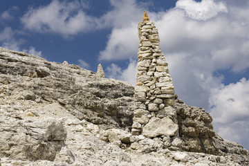 Stone mounds on top of Sass Pordoi. Dolomites. Italy.