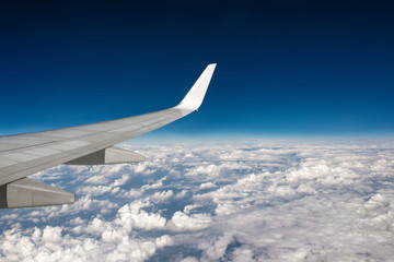 Morning cloudy sunrise with Wing of an airplane. picture for add text message or frame website. Traveling concept
