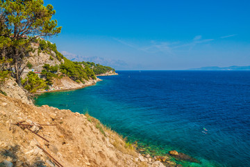 Fototapeta na wymiar Croatia coasline. Bay and crystal clear water of Adriatic Sea.