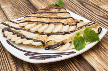 Crepes with bananas and cream