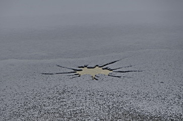 Interesting natural background of thawing at frozen lake in village Pancharevo, Sofia, Bulgaria 