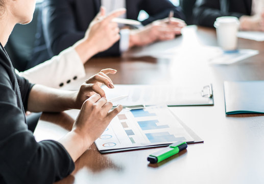 Business partners discussing documents