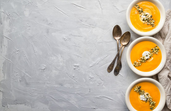 Squash soup on gray concrete background
