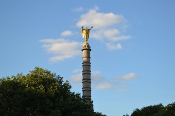 Fototapeta premium Majestic monumental fountain commemorating the victories of Napoleon Bonaparte in Place du Chatelet, Paris, France