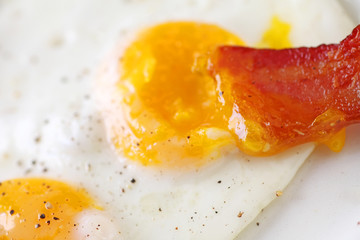 Bacon dipped in egg yolk macro