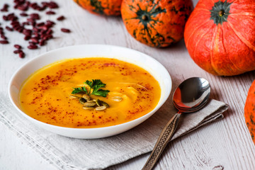 Pumpkin soup with seeds and parsley. Vegan food