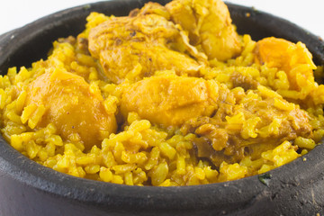 Galinhada: chicken with pequi