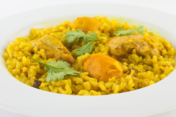 Galinhada: chicken with pequi