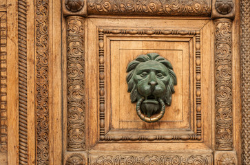 details of an old wooden carved door