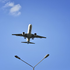 aircraft flies in the  sky view from below